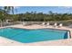 Beautiful pool with several lounge chairs near the water at 1322 Perico Point Cir, Bradenton, FL 34209