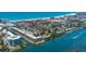 Breathtaking aerial view of waterfront condos with beach access and coastal scenery at 1350 N Portofino Dr # 208, Sarasota, FL 34242