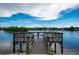 Community pier offering serene waterfront views and access to boating and water activities at 1350 N Portofino Dr # 208, Sarasota, FL 34242