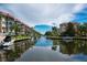 Beautiful waterfront views, with boat docks, showcasing coastal lifestyle and serene views at 1350 N Portofino Dr # 208, Sarasota, FL 34242