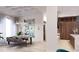 Bright dining room with modern lighting, dining table, adjacent living and kitchen area at 1384 Harbor Dr, Sarasota, FL 34239