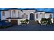 Stunning exterior view of a two-story home with a black roof, blue front door, and a 3-car garage at 1384 Harbor Dr, Sarasota, FL 34239