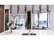 Bright, open living space with kitchen, water view, adjacent dining and seating area at 1384 Harbor Dr, Sarasota, FL 34239
