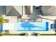 Birds-eye view of a luxury pool featuring in-pool seating, manicured landscaping, and outdoor entertaining spaces at 1384 Harbor Dr, Sarasota, FL 34239