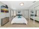 Modern bedroom featuring a spacious layout, TV, and large closet at 170 Roosevelt Dr # 2, Sarasota, FL 34236