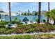 Pelican Gardens sign surrounded by well-maintained landscaping at 170 Roosevelt Dr # 2, Sarasota, FL 34236