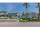 Exterior shot of the community, showing building facade and Pelican Gardens sign at 170 Roosevelt Dr # 2, Sarasota, FL 34236