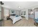 Bright studio with bed, mirrored closet, kitchenette, and light wood flooring provides relaxed, comfortable living at 170 Roosevelt Dr # 2, Sarasota, FL 34236