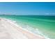 A beautiful view of the beach and the ocean on a bright sunny day at 1770 Benjamin Franklin Dr # 407, Sarasota, FL 34236