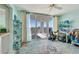 Bonus room features large windows with views and exercise equipment at 1770 Benjamin Franklin Dr # 407, Sarasota, FL 34236