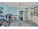 Bonus room features a desk, area rug and built-in storage shelves at 1770 Benjamin Franklin Dr # 407, Sarasota, FL 34236