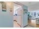 Cozy kitchen adjacent to a living room featuring bright decor and great natural light at 1770 Benjamin Franklin Dr # 407, Sarasota, FL 34236