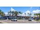Lively street view showcasing a variety of restaurants, shops, and businesses, offering a dynamic atmosphere at 1770 Benjamin Franklin Dr # 407, Sarasota, FL 34236