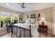 Inviting bedroom with large windows and an abundance of natural light at 1780 Pine Harrier Cir, Sarasota, FL 34231