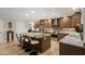 Beautifully renovated kitchen with a large island, stainless steel appliances, and custom cabinetry for ample storage at 1780 Pine Harrier Cir, Sarasota, FL 34231