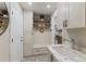 Inviting mud room boasts built-in bench, storage, and stylish tile flooring, blending functionality with elegant design at 1780 Pine Harrier Cir, Sarasota, FL 34231