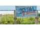 Siesta Beach signage boasts #1 beach status in the USA, highlighting local appeal at 1780 Pine Harrier Cir, Sarasota, FL 34231
