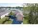 Aerial view of a single-Gathering home with a well-manicured lawn and mature trees in a vibrant neighborhood at 2330 28Th E Ave, Palmetto, FL 34221