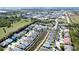 Wide aerial view of a neighborhood with waterfront homes and community features at 2330 28Th E Ave, Palmetto, FL 34221