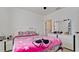Bedroom featuring bright decor, a large mirror, and closet space at 2330 28Th E Ave, Palmetto, FL 34221