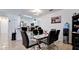 This open dining area features a modern table, bright walls, and seating for six at 2330 28Th E Ave, Palmetto, FL 34221