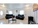 The living room boasts tile flooring, bright walls, ample natural light and comfortable seating for entertaining at 2330 28Th E Ave, Palmetto, FL 34221