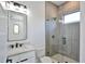 Modern bathroom with glass shower, sleek vanity, and upscale fixtures at 2335 Oak Ter, Sarasota, FL 34231