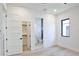 Bright bedroom with ensuite bathroom and closet, plus light wood-style flooring at 2335 Oak Ter, Sarasota, FL 34231