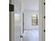 Bright bedroom boasts a large window and wood floors at 2335 Oak Ter, Sarasota, FL 34231
