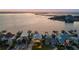 Expansive waterfront property with private docks and easy access to the open water, perfect for boating enthusiasts at 2438 Baywood W Dr, Dunedin, FL 34698