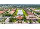 Aerial shot of the community clubhouse, pool, and lush landscaping, highlighting community amenities at 2745 62Nd E Ave, Ellenton, FL 34222