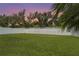 Expansive backyard featuring a well-maintained lawn and a white privacy fence, offering a serene outdoor space at 2745 62Nd E Ave, Ellenton, FL 34222