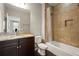 Updated bathroom features granite countertops, a dark wood vanity, and a tiled shower/tub combo at 2745 62Nd E Ave, Ellenton, FL 34222