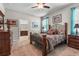 Cozy bedroom with a large bed, decorative pillows, and bedside tables at 2745 62Nd E Ave, Ellenton, FL 34222