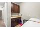 Functional laundry room with cabinets, sink, and modern appliances at 2745 62Nd E Ave, Ellenton, FL 34222