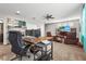 Open-concept living area featuring recliners and a workspace at 2745 62Nd E Ave, Ellenton, FL 34222