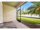 Enjoy this relaxing screened-in lanai with brick pavers and views of the green lawn at 2745 62Nd E Ave, Ellenton, FL 34222
