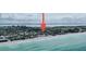 An aerial view of a beach house development along a pristine coastline at 2944 Gulf Of Mexico Dr, Longboat Key, FL 34228