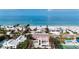 Stunning beachside property with modern architecture, showcasing panoramic ocean views at 2944 Gulf Of Mexico Dr, Longboat Key, FL 34228
