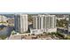 High-rise condo featuring private balconies, swimming pool, and convenient access to city amenities at 301 Quay Commons Dr # 1711, Sarasota, FL 34236