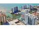 Stunning aerial view of a waterfront condo with beautiful ocean views and building amenities at 301 Quay Commons Dr # 1711, Sarasota, FL 34236