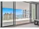 Balcony overlooking the ocean, providing a seamless indoor-outdoor living experience with stunning city views at 301 Quay Commons Dr # 1711, Sarasota, FL 34236