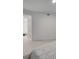Bright bedroom featuring light wood floors and neutral walls at 301 Quay Commons Dr # 1711, Sarasota, FL 34236