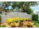 Entrance to Marie Selby Botanical Gardens with lush plants and trees at 301 Quay Commons Dr # 1711, Sarasota, FL 34236