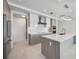Bright kitchen with stainless steel appliances, spacious island, and modern cabinets at 301 Quay Commons Dr # 1711, Sarasota, FL 34236