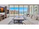 Modern living room with scenic water views, comfortable seating, and a bright, open atmosphere at 301 Quay Commons Dr # 1711, Sarasota, FL 34236