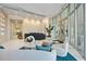 Inviting lobby area with modern decor, comfortable seating, and stylish reception desk at 301 Quay Commons Dr # 1711, Sarasota, FL 34236