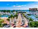 Picturesque marina view with luxury yachts, palm-lined drive, and waterfront views of downtown at 301 Quay Commons Dr # 1711, Sarasota, FL 34236