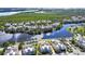 Aerial view of home, showing community and lake views at 311 Compass Point Dr # 101, Bradenton, FL 34209