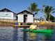 Waterfront featuring kayak access, docks, and charming waterfront cottages in a vibrant community at 311 Compass Point Dr # 101, Bradenton, FL 34209